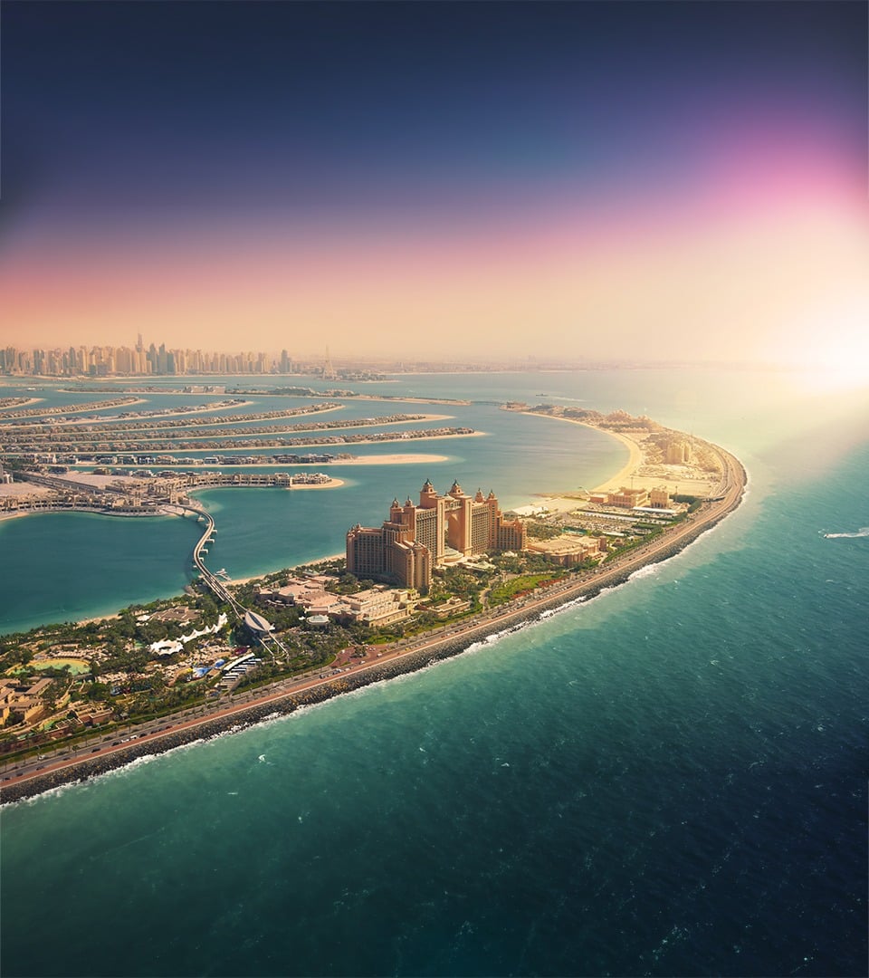 Aerial of Palm Jumeirah and Atlantis at sunrise marking an AHS Properties milestone in 2021