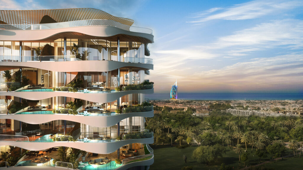 One Canal facade close-up with sculptural balconies, sky gardens and the Burj Al Arab on the horizon